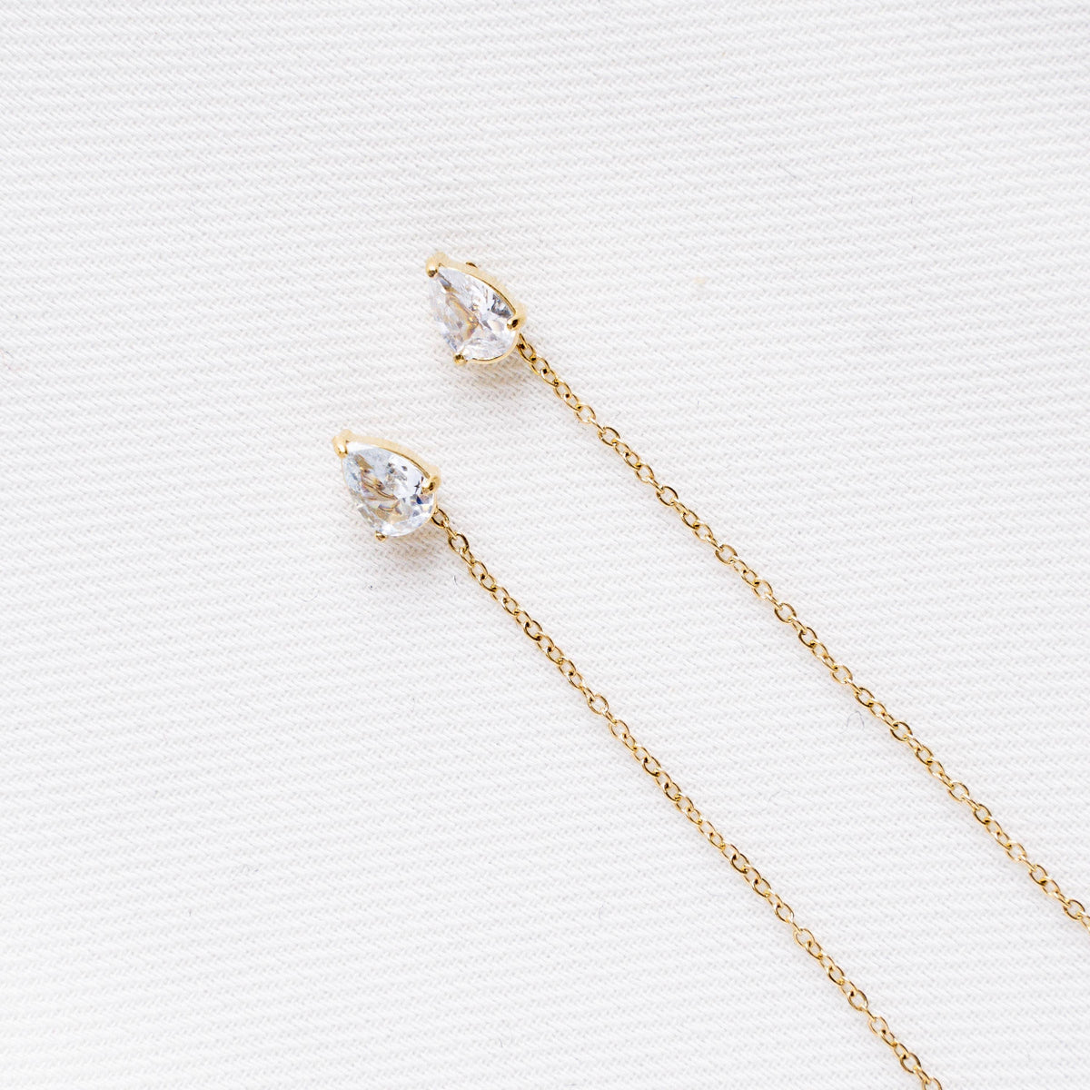 Oorbellen met hangende ketting en druppel