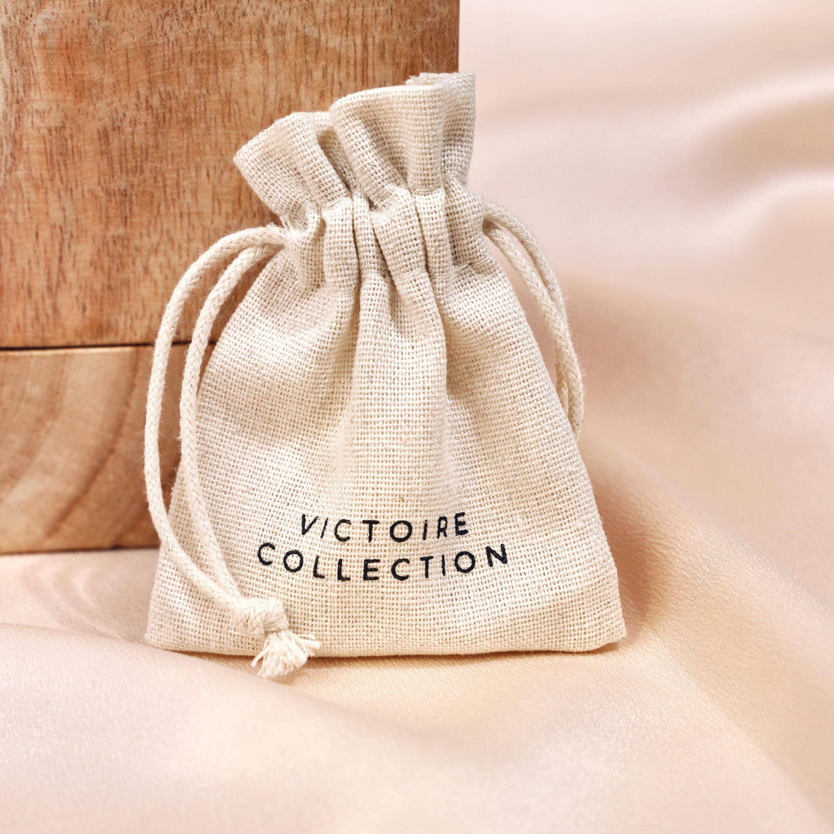 Oorbellen met hangende ketting en druppel