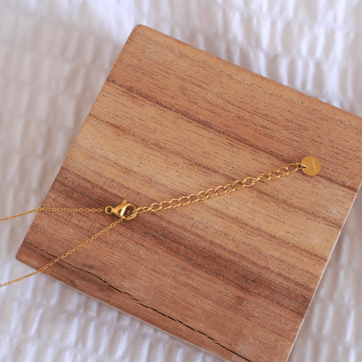 Ketting met witte klaver