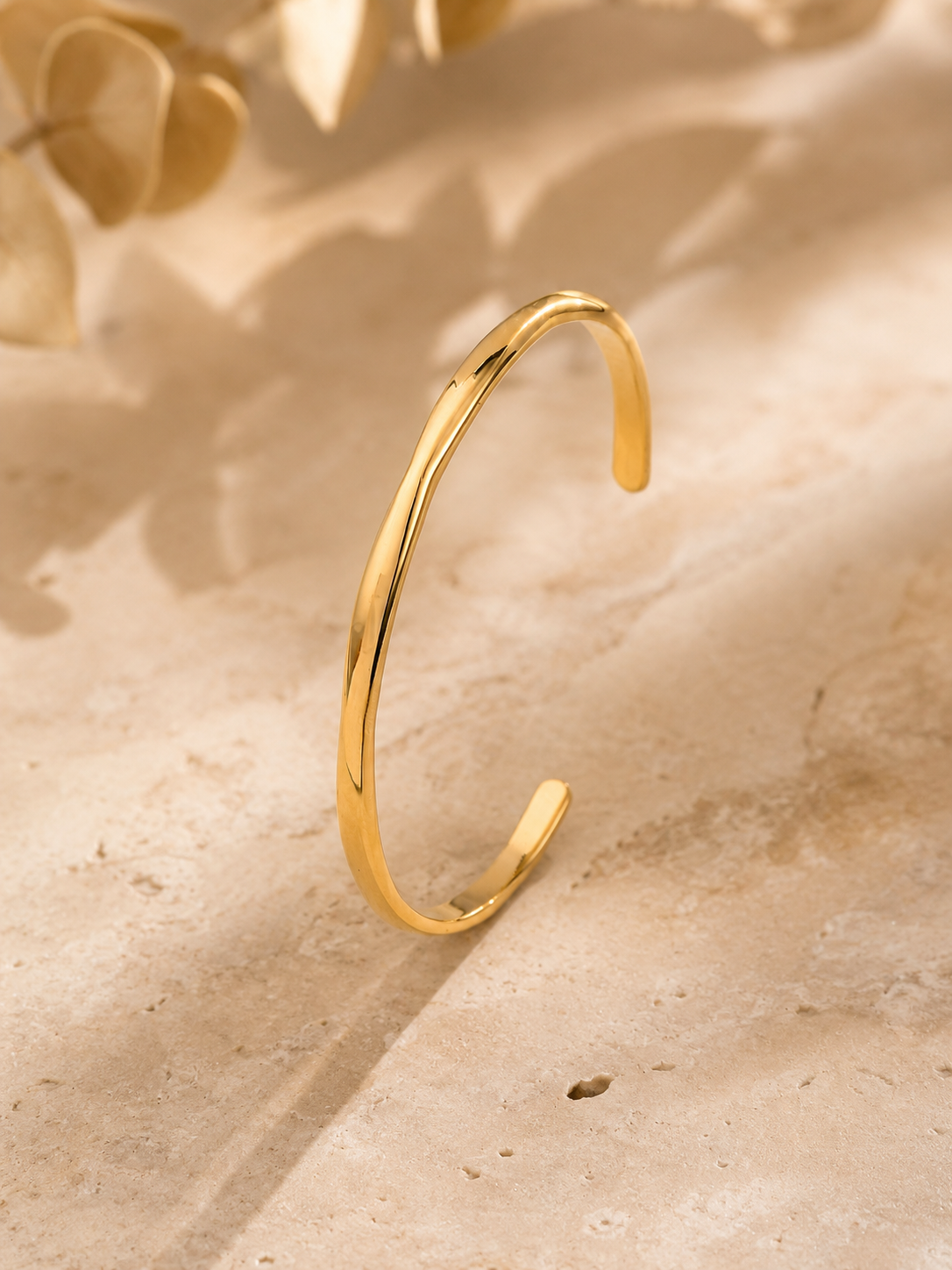 Golvende armband goud